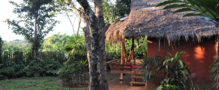 A classic moment in a thai wooden house watching sunset